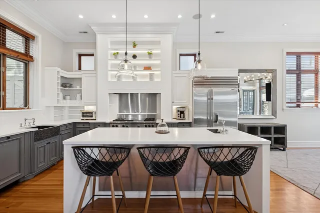 a dinning table and chairs in a kitchen