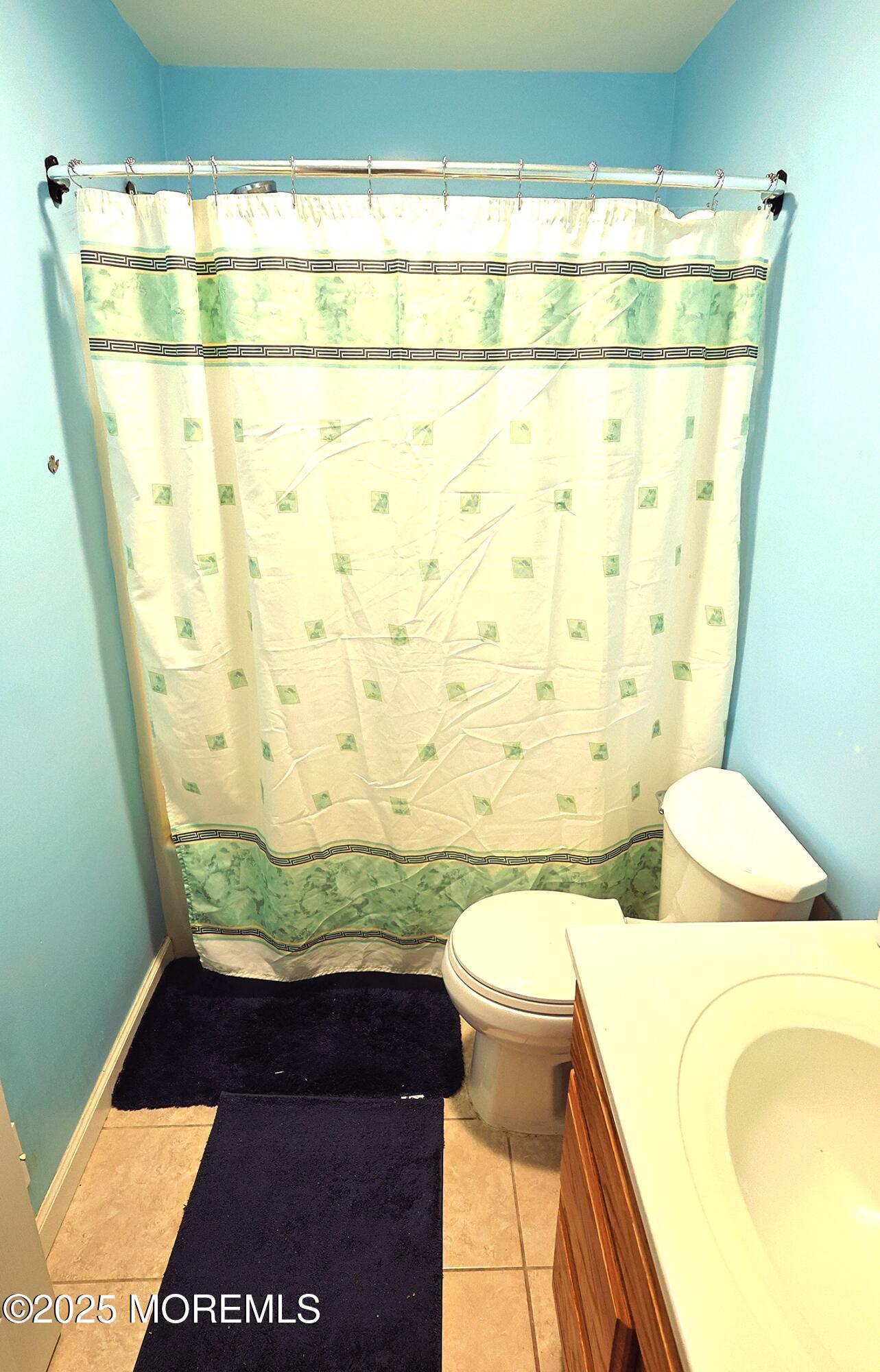 1509 Embury Avenue Neptune Township, NJ 07753 - Photo 14 of 15 a bathroom with a sink and a toilet