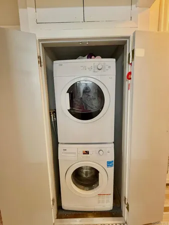 a utility room with dryer and washer