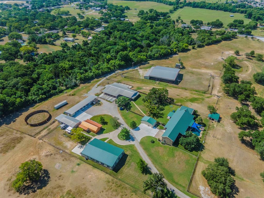 an aerial view of a house with a garden