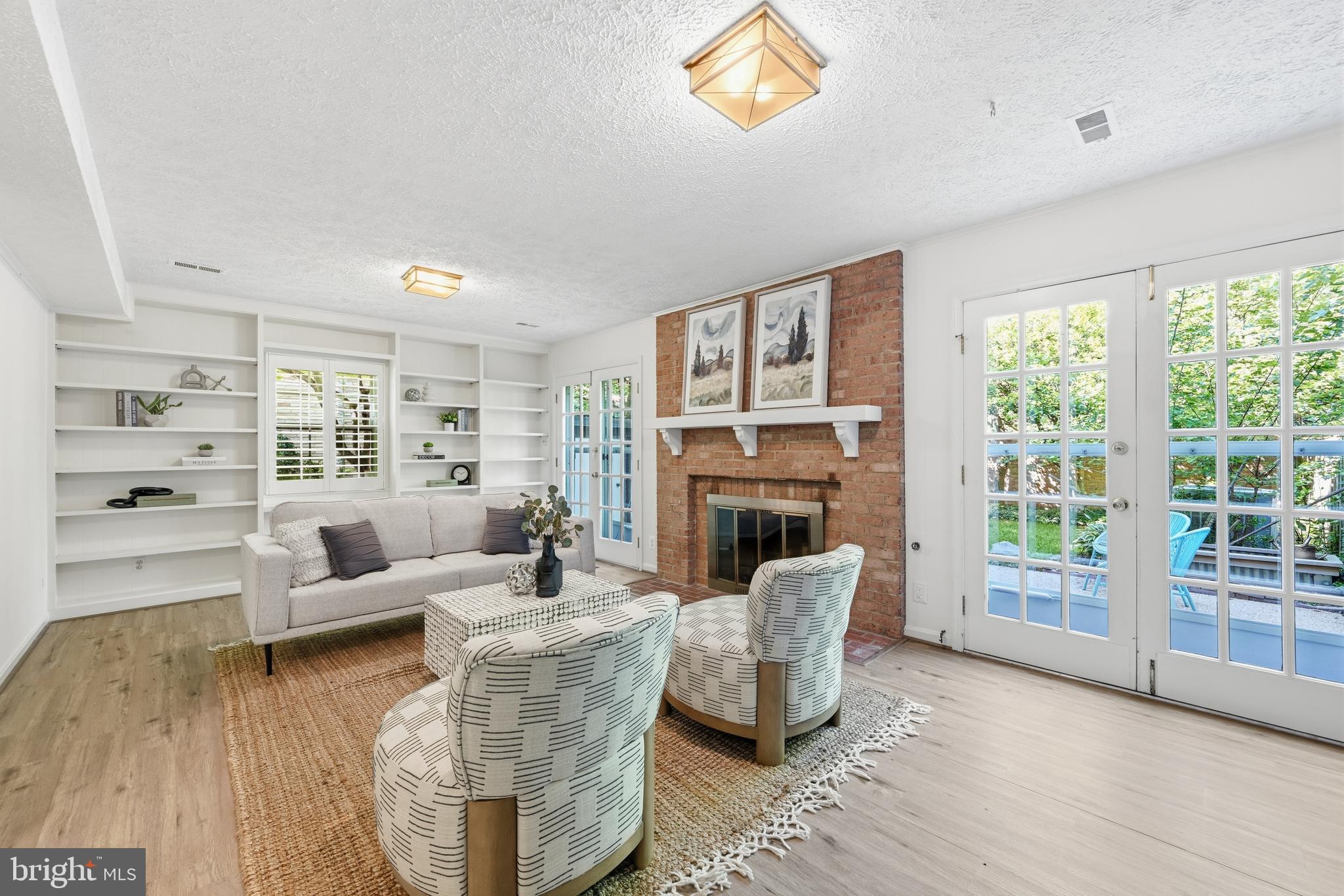 2311 North Glebe Road Arlington, VA 22207 - Photo 19 of 33 LL rec/fam room with built ins and doors to patio