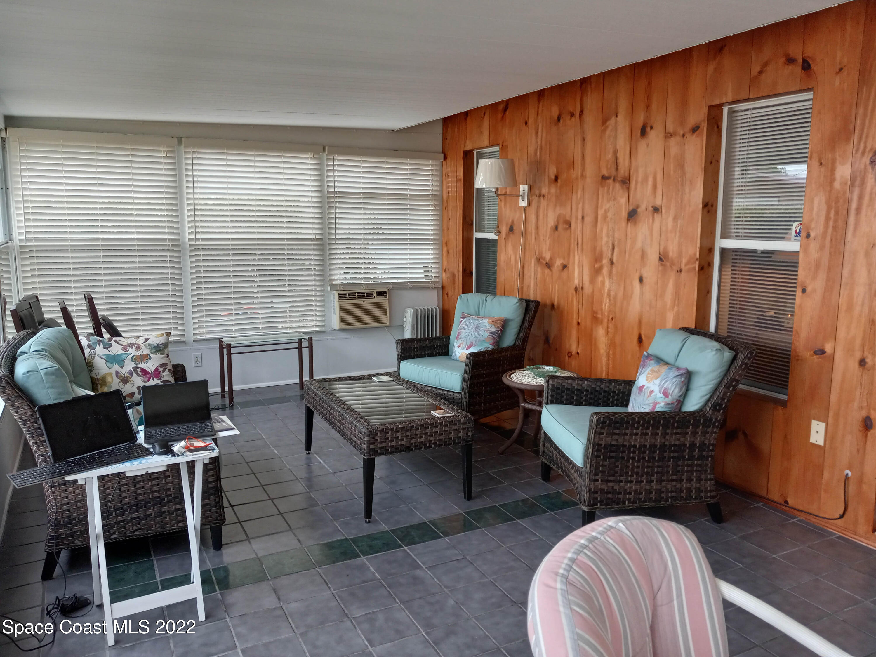 5166 Arlington Road Cocoa, FL 32927 - Photo 20 of 25 a living room with furniture and a window