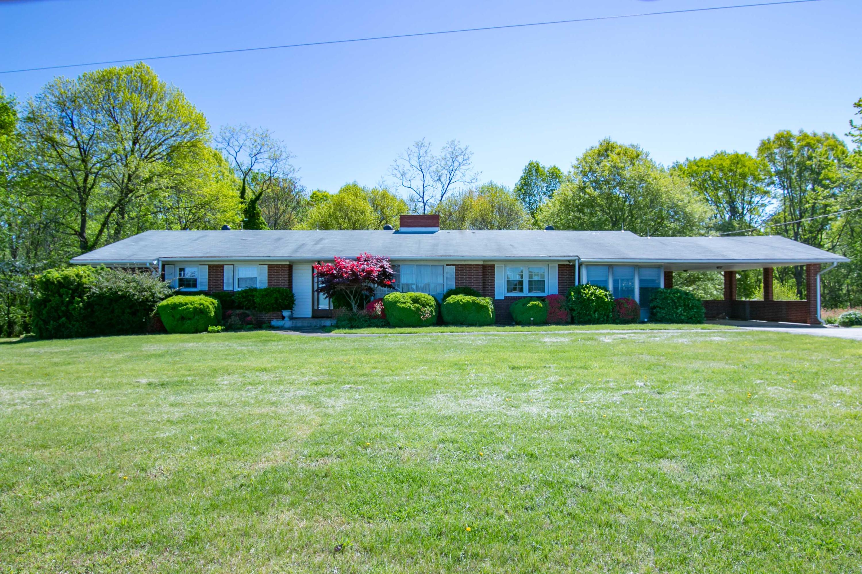 3256 Sago Road Callands, VA 24530 - Photo 1 of 59 a front view of a house with a yard