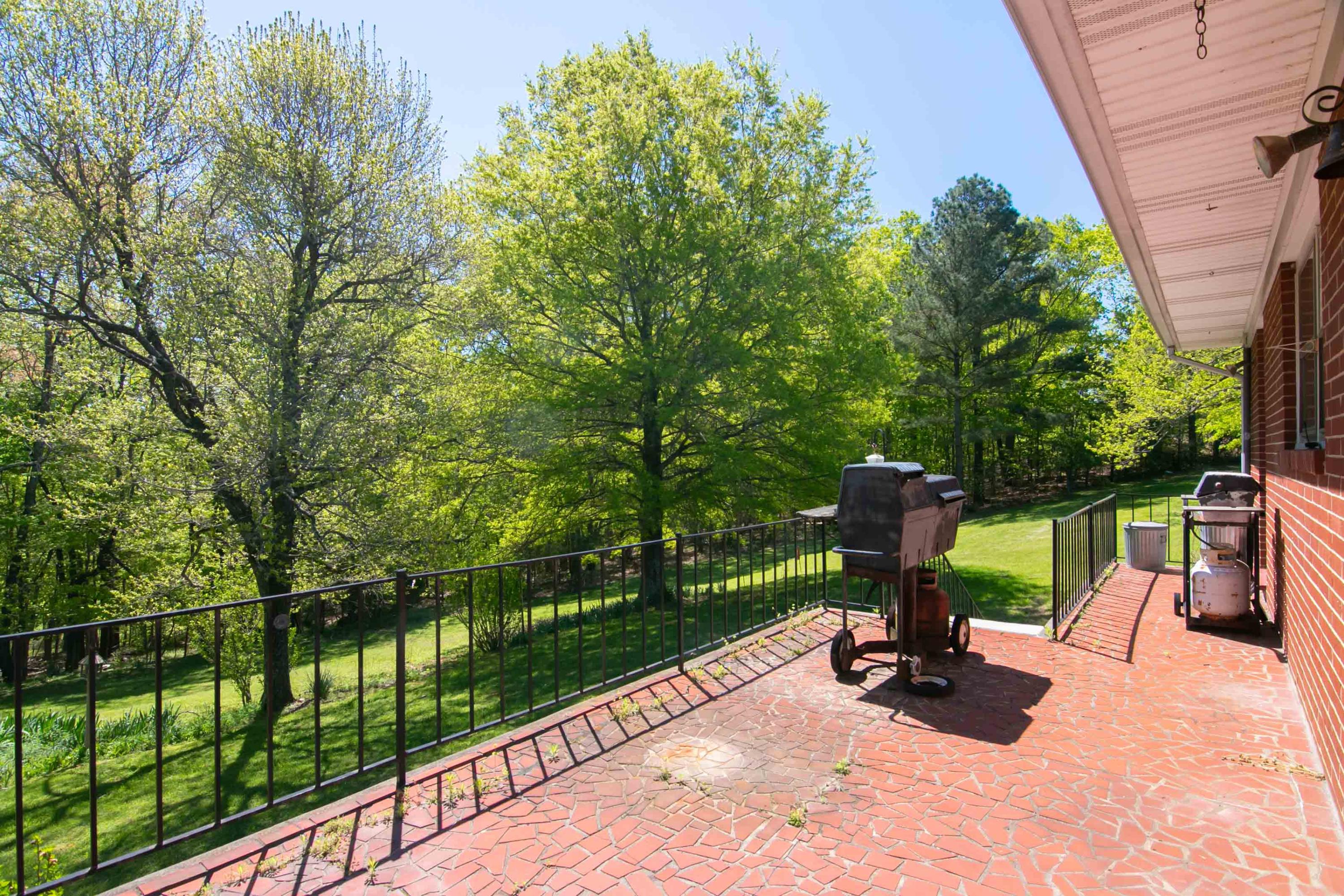 3256 Sago Road Callands, VA 24530 - Photo 47 of 59 a view of a swimming pool with a patio and a garden