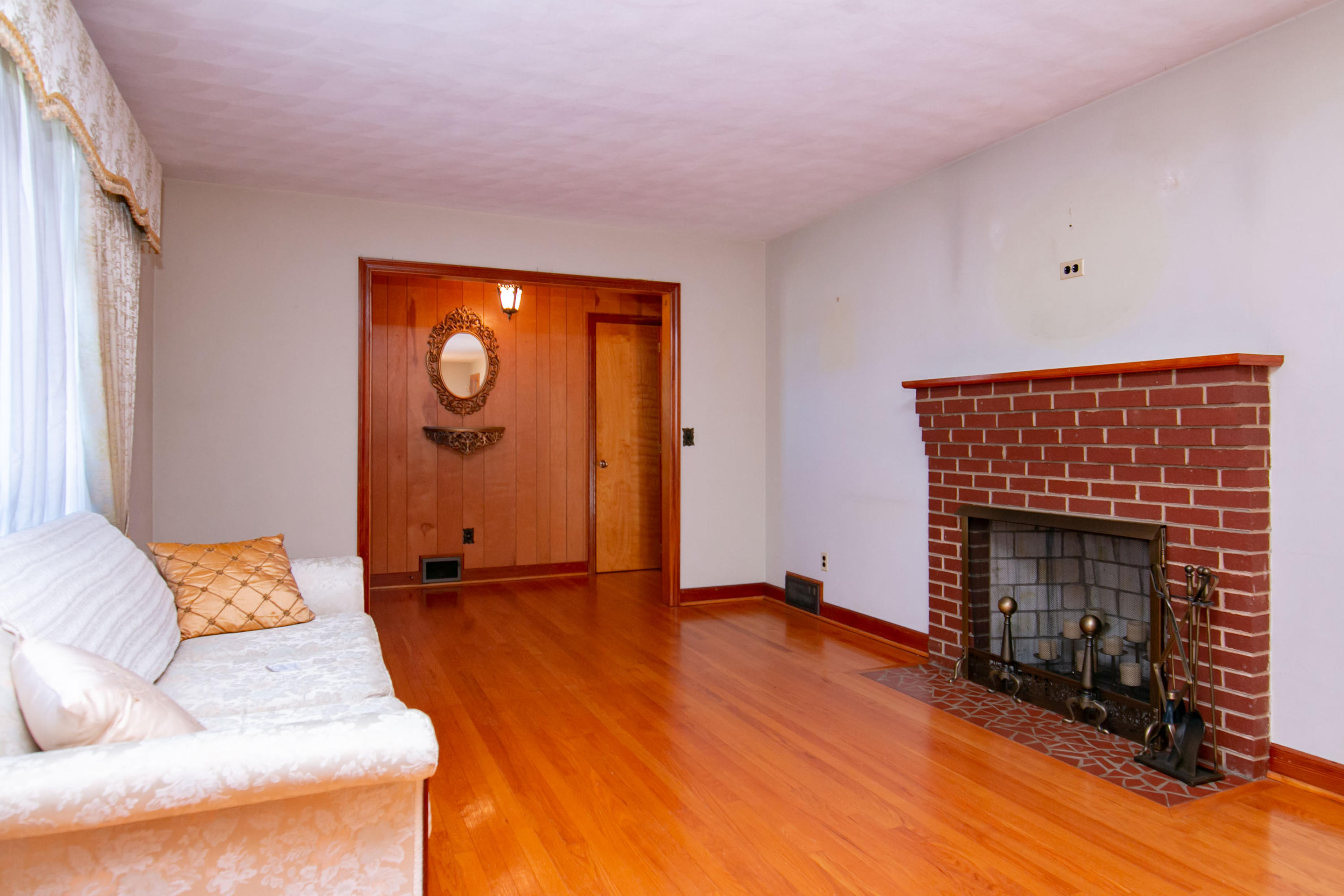 3256 Sago Road Callands, VA 24530 - Photo 7 of 59 a living room with furniture and a fireplace