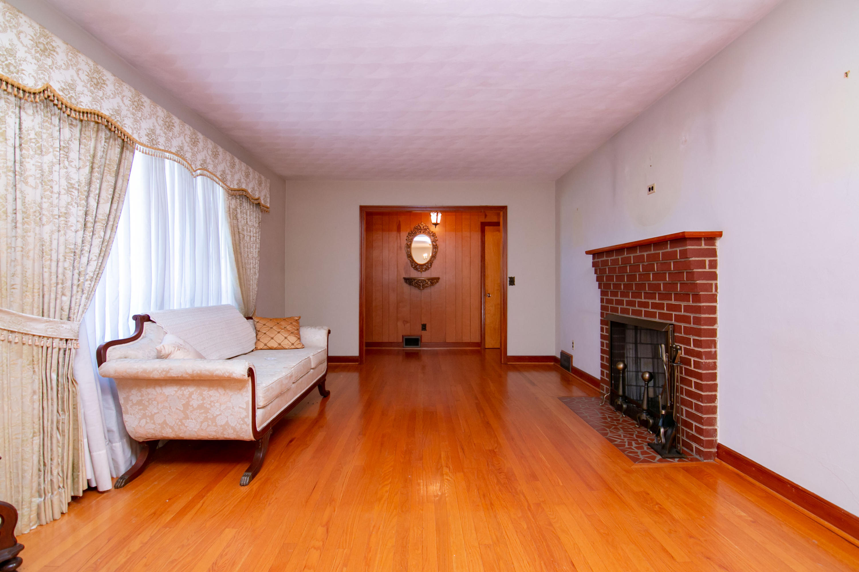 3256 Sago Road Callands, VA 24530 - Photo 8 of 59 a bedroom with a bed and a fireplace
