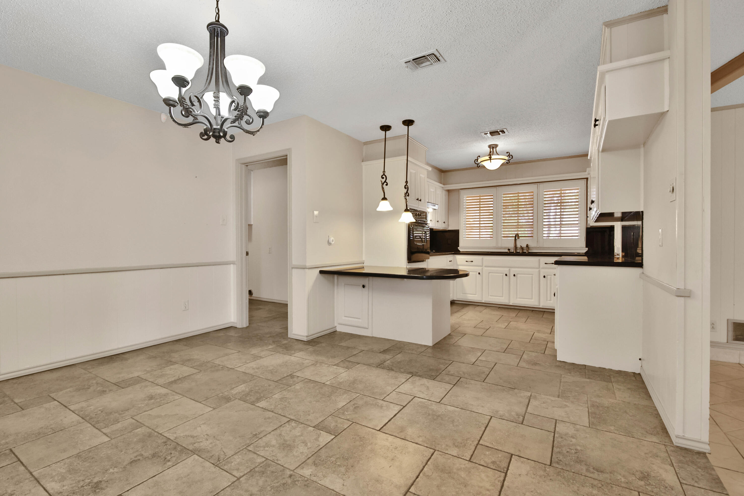 5721 80th Street Lubbock, TX 79424 - Photo 11 of 41 Dining to Kitchen