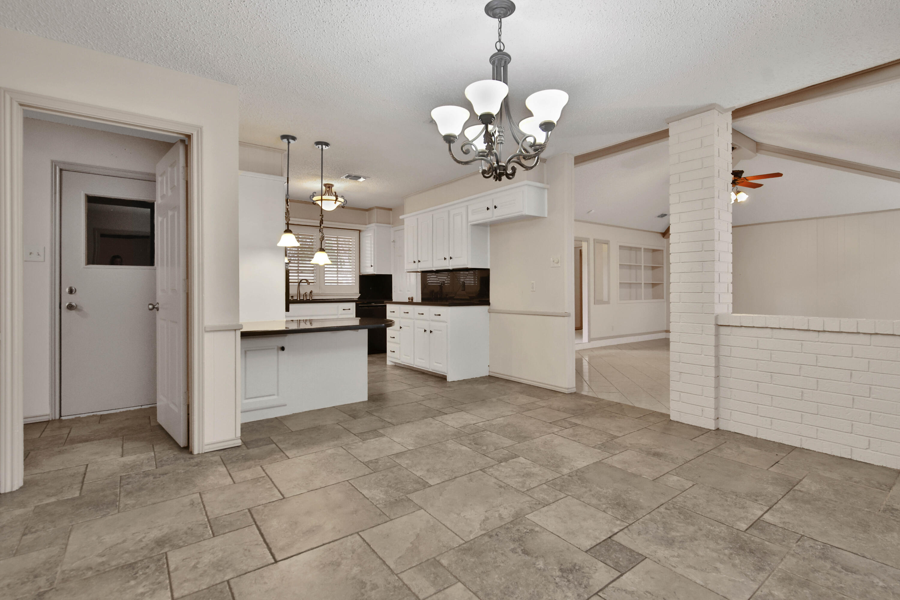 5721 80th Street Lubbock, TX 79424 - Photo 12 of 41 Dining to Kitchen/Living Room
