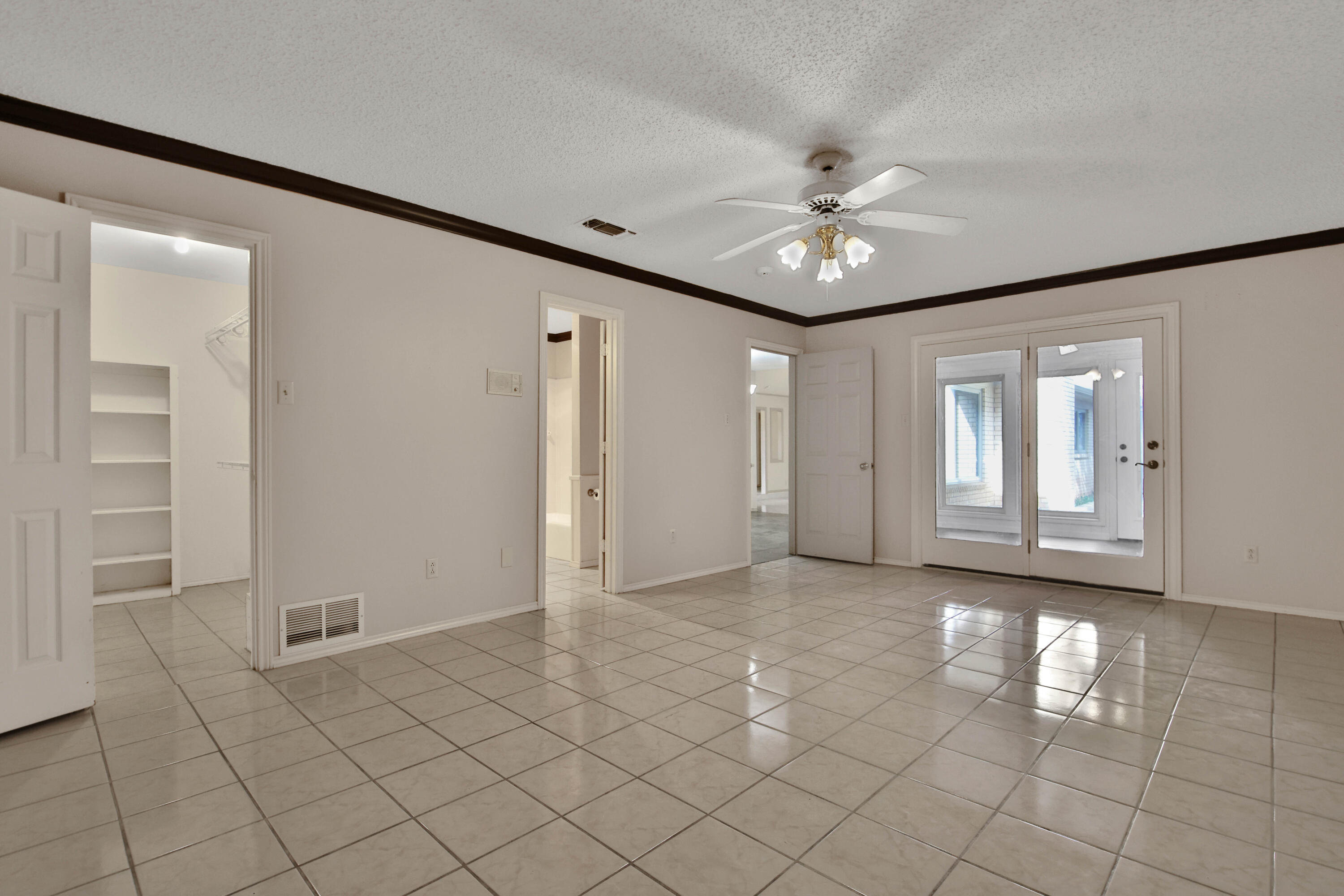 5721 80th Street Lubbock, TX 79424 - Photo 15 of 41 Primary Suite to Sunroom