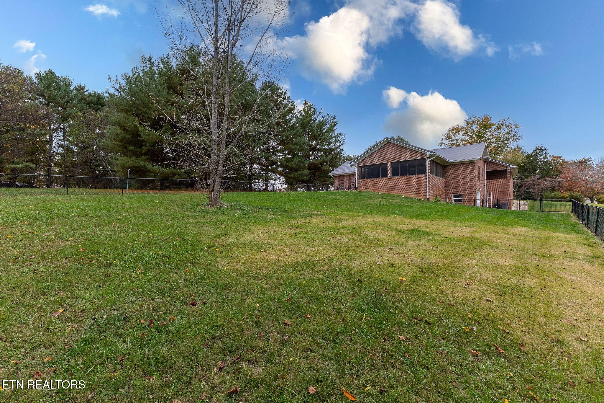 6251 Grimes Road Loudon, TN 37774 - Photo 34 of 43 a view of a big yard with a house