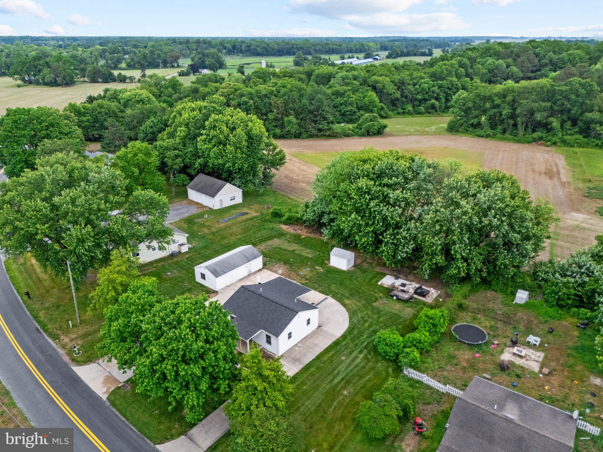 6475 Big Stone Beach Road Milford, DE 19963 - Photo 49 of 52 an aerial view of a house with a yard