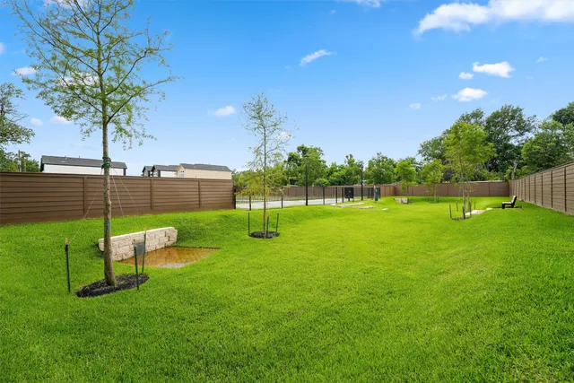 a view of a brick house front of a house