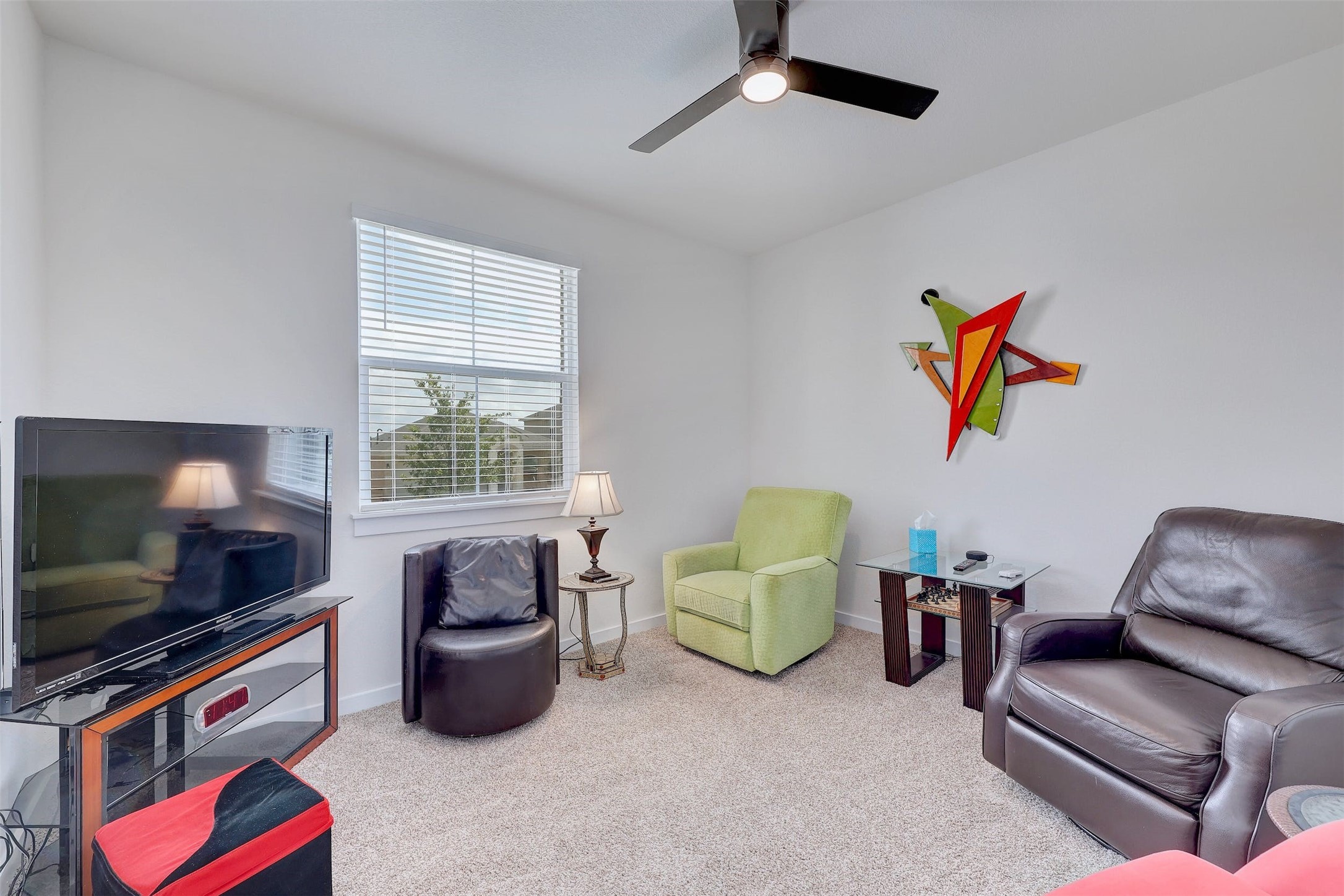 2041 Centerline Lane Georgetown, TX 78628 - Photo 20 of 31 a living room with furniture and a flat screen tv