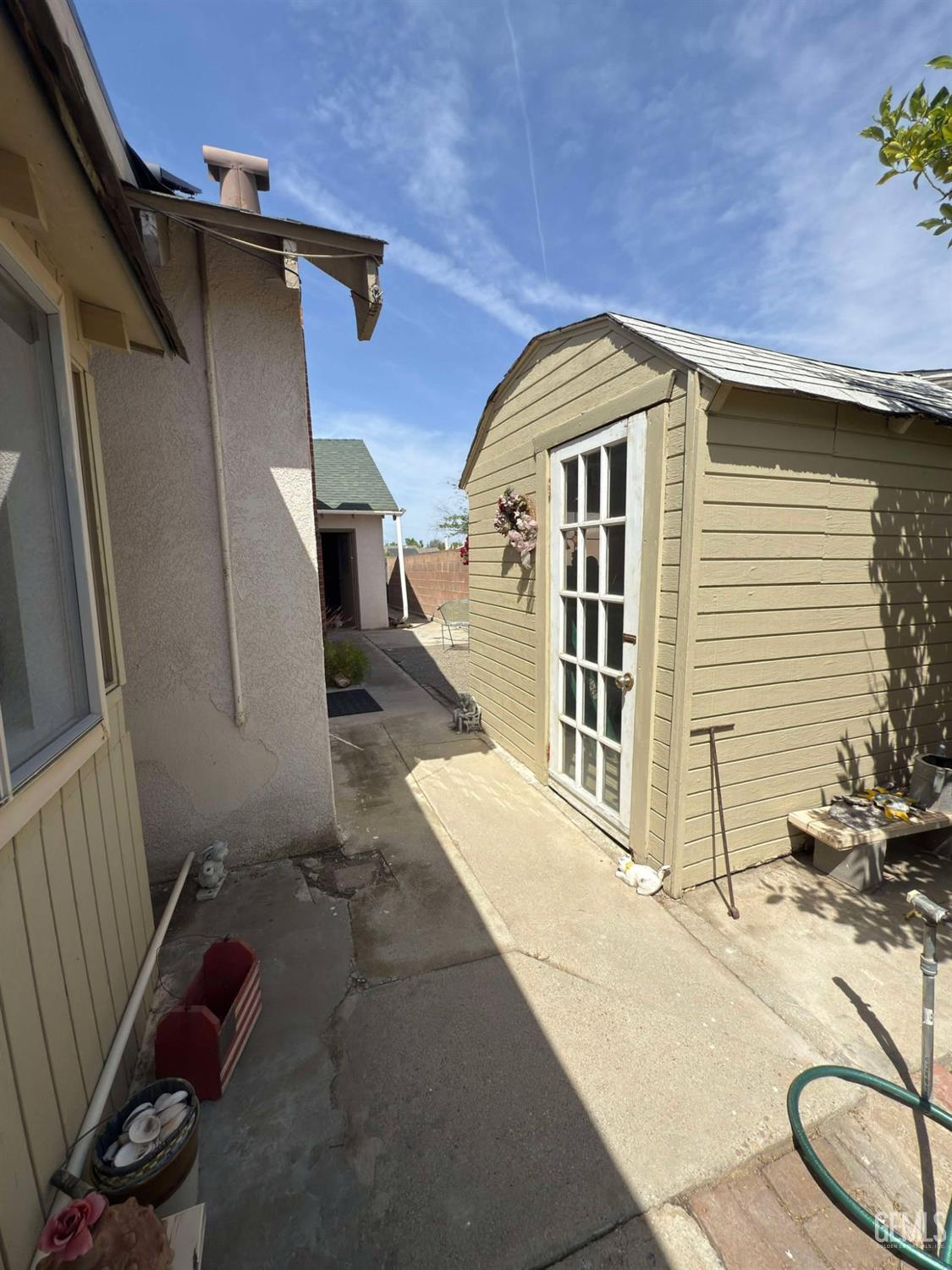 Undisclosed Address Bakersfield, CA 93306 - Photo 15 of 17 a view of front door of house