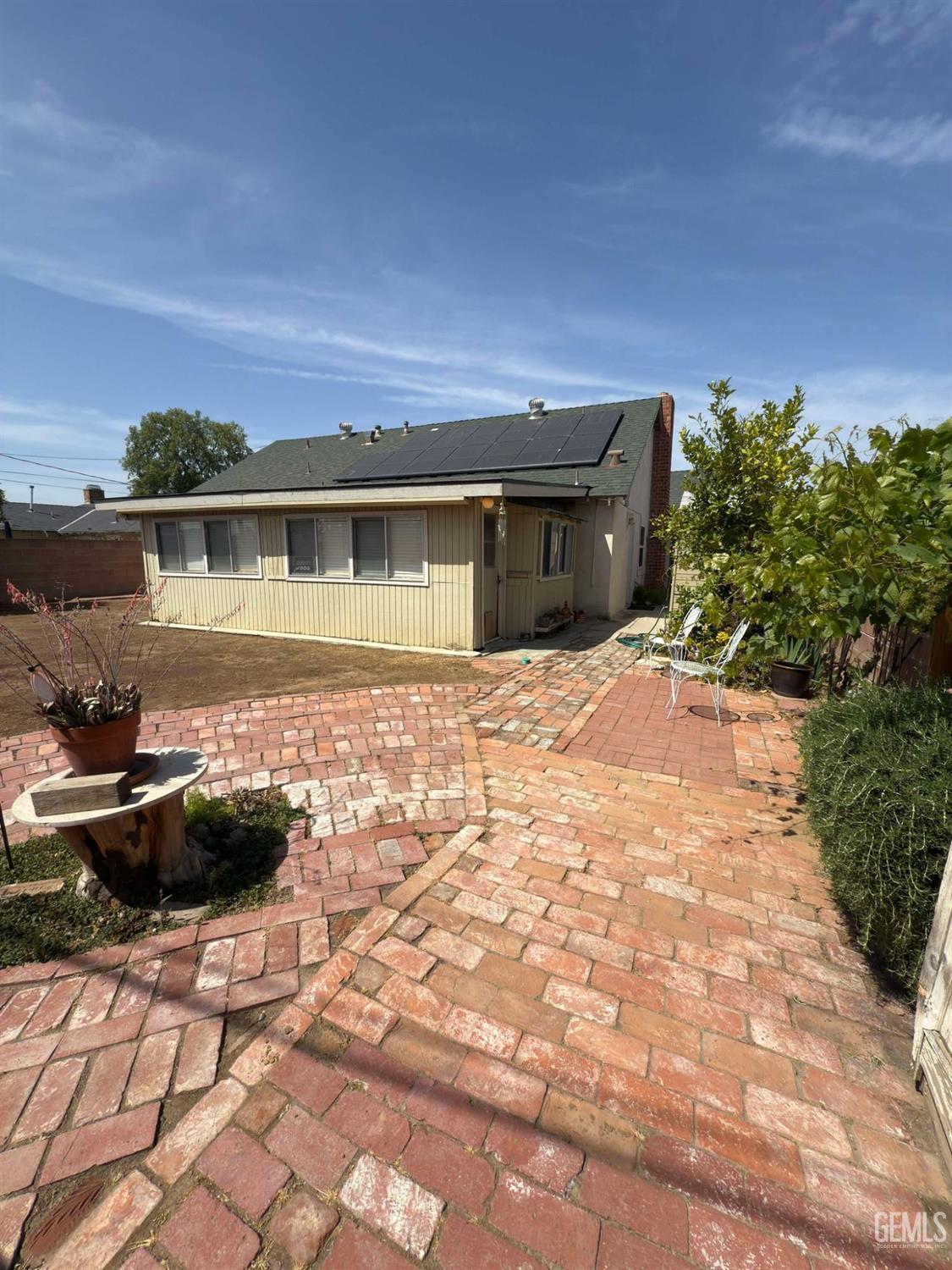 Undisclosed Address Bakersfield, CA 93306 - Photo 17 of 17 a front view of a house with a yard