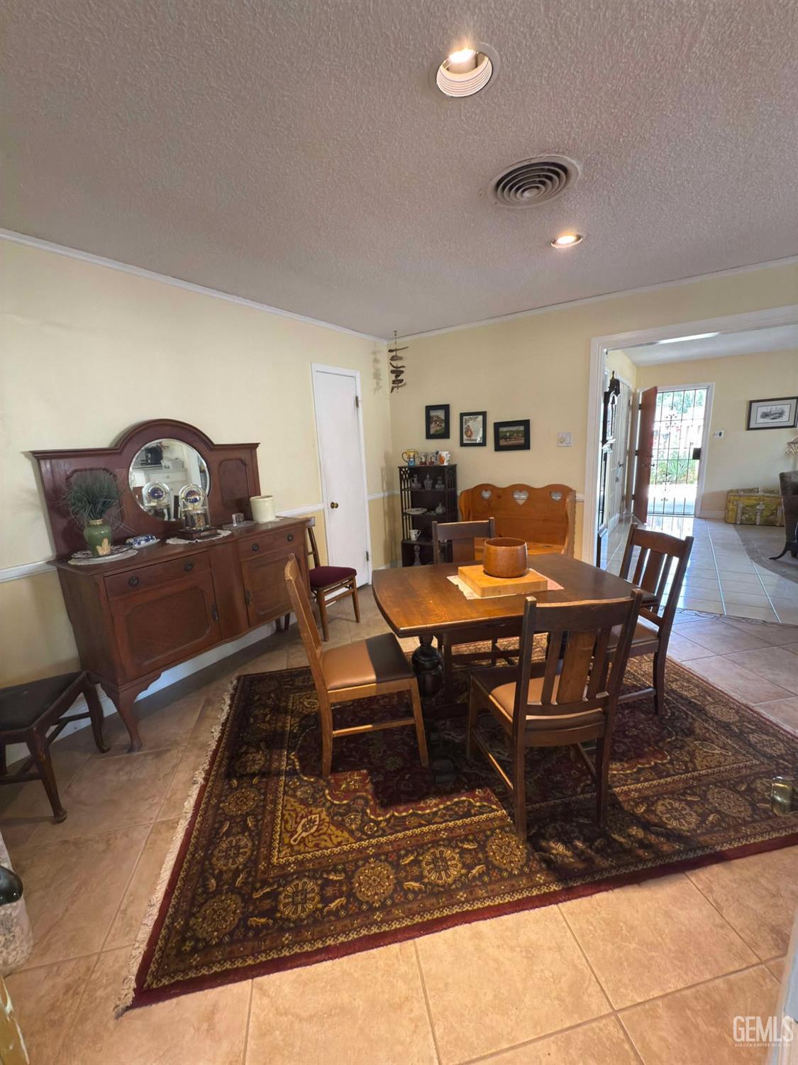 Undisclosed Address Bakersfield, CA 93306 - Photo 7 of 17 a living room with furniture and a rug