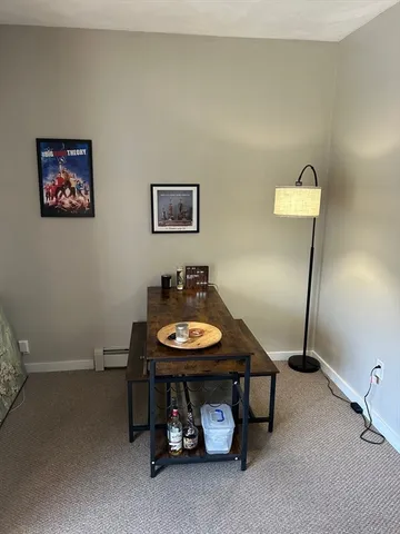 a room with furniture and window