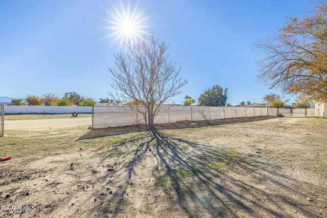 a view of yard covered with snow