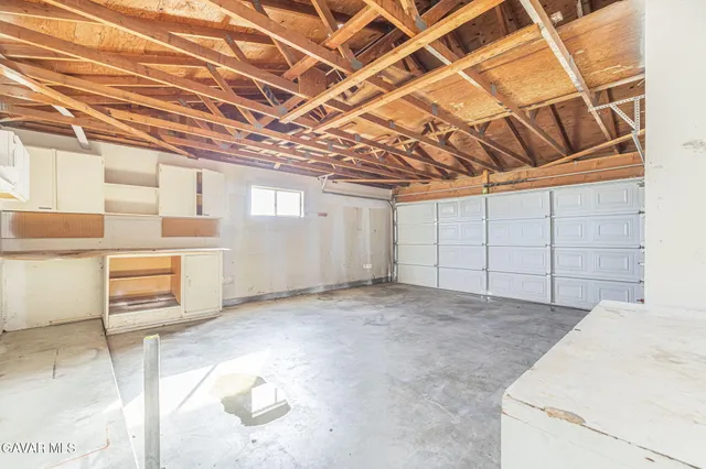 a view of a room with racks on the wall