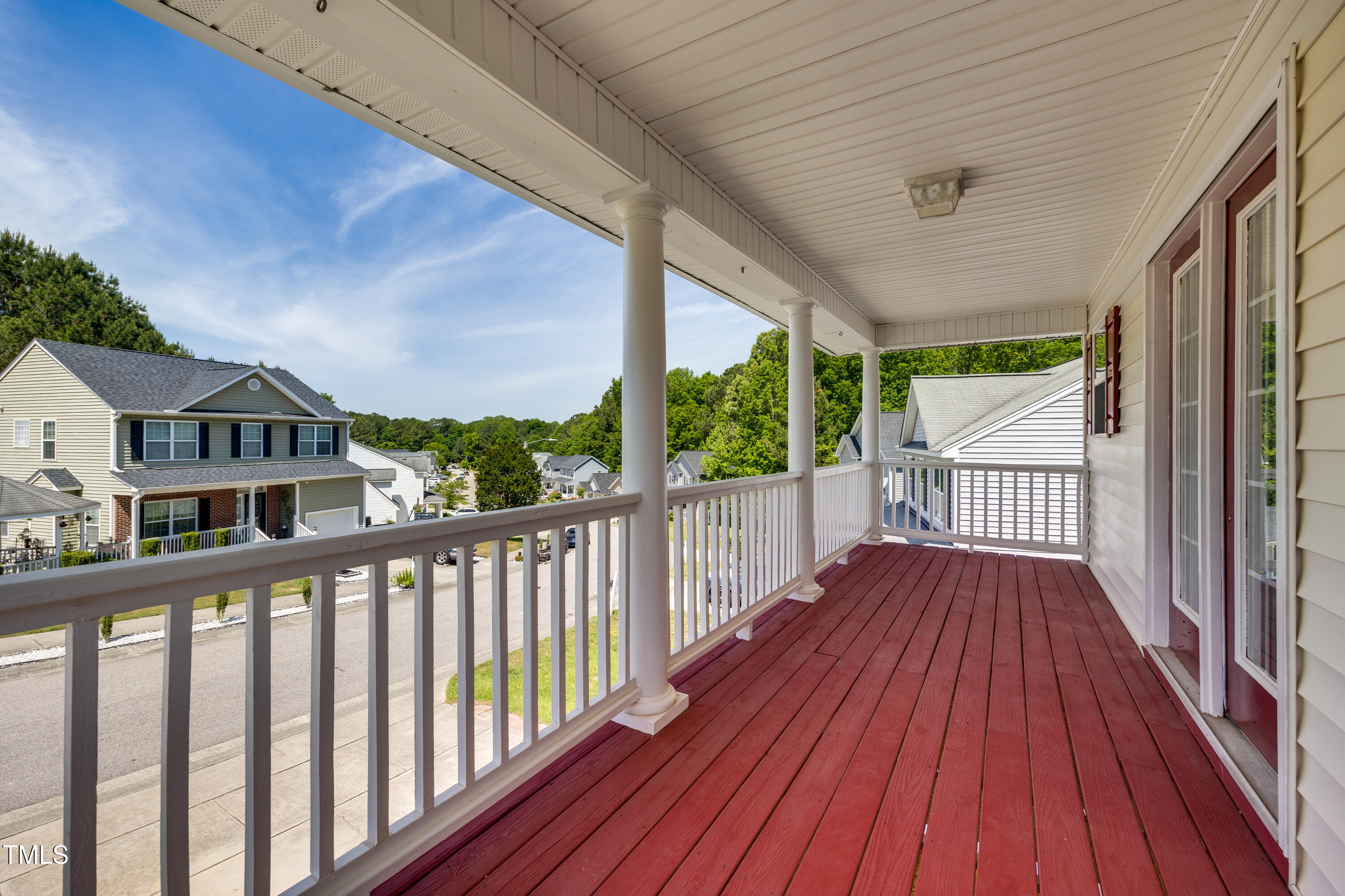 5865 Forest Point Road Raleigh, NC 27610 - Photo 21 of 37 a view of balcony with wooden floor