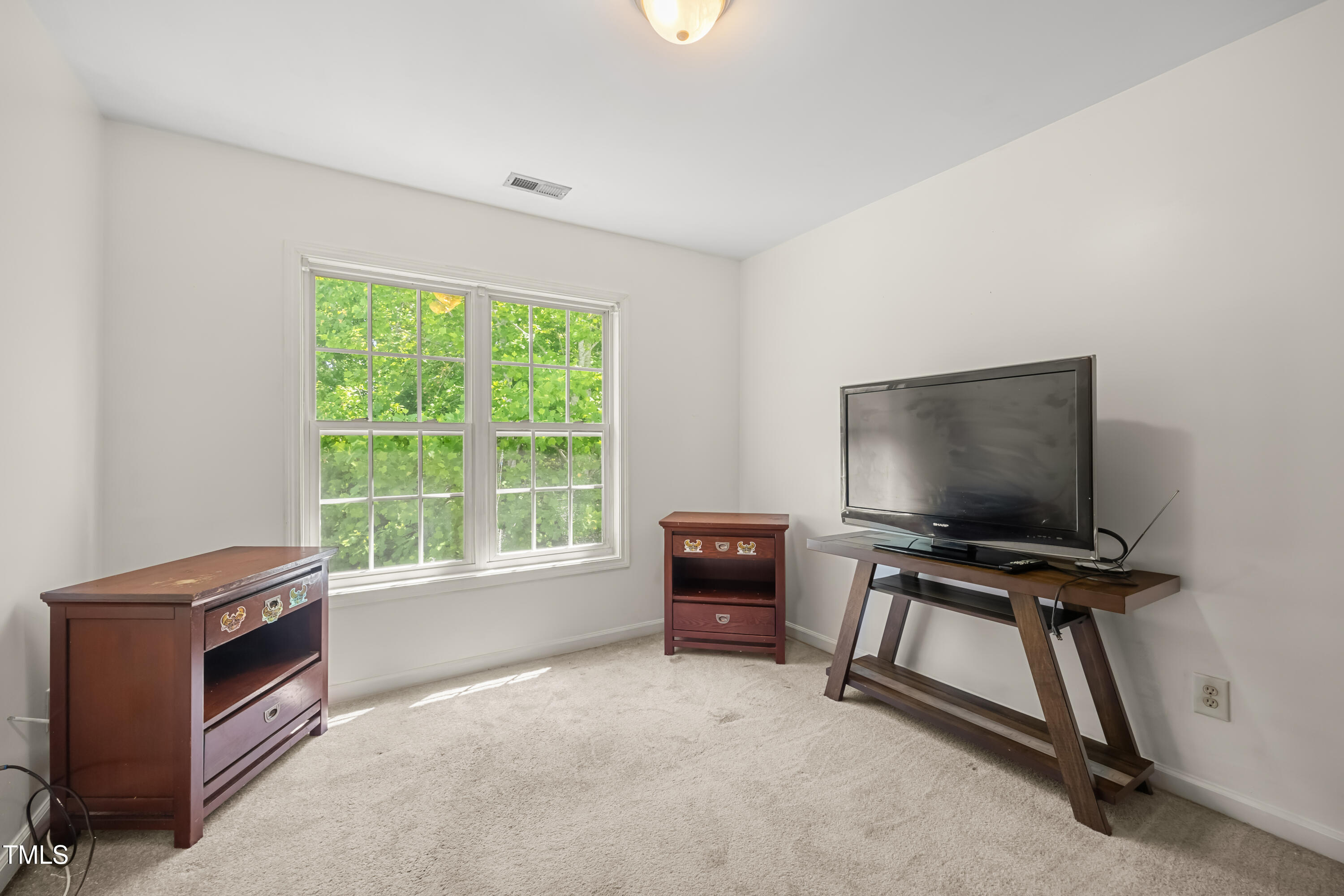 5865 Forest Point Road Raleigh, NC 27610 - Photo 25 of 37 a view of workspace with furniture and window