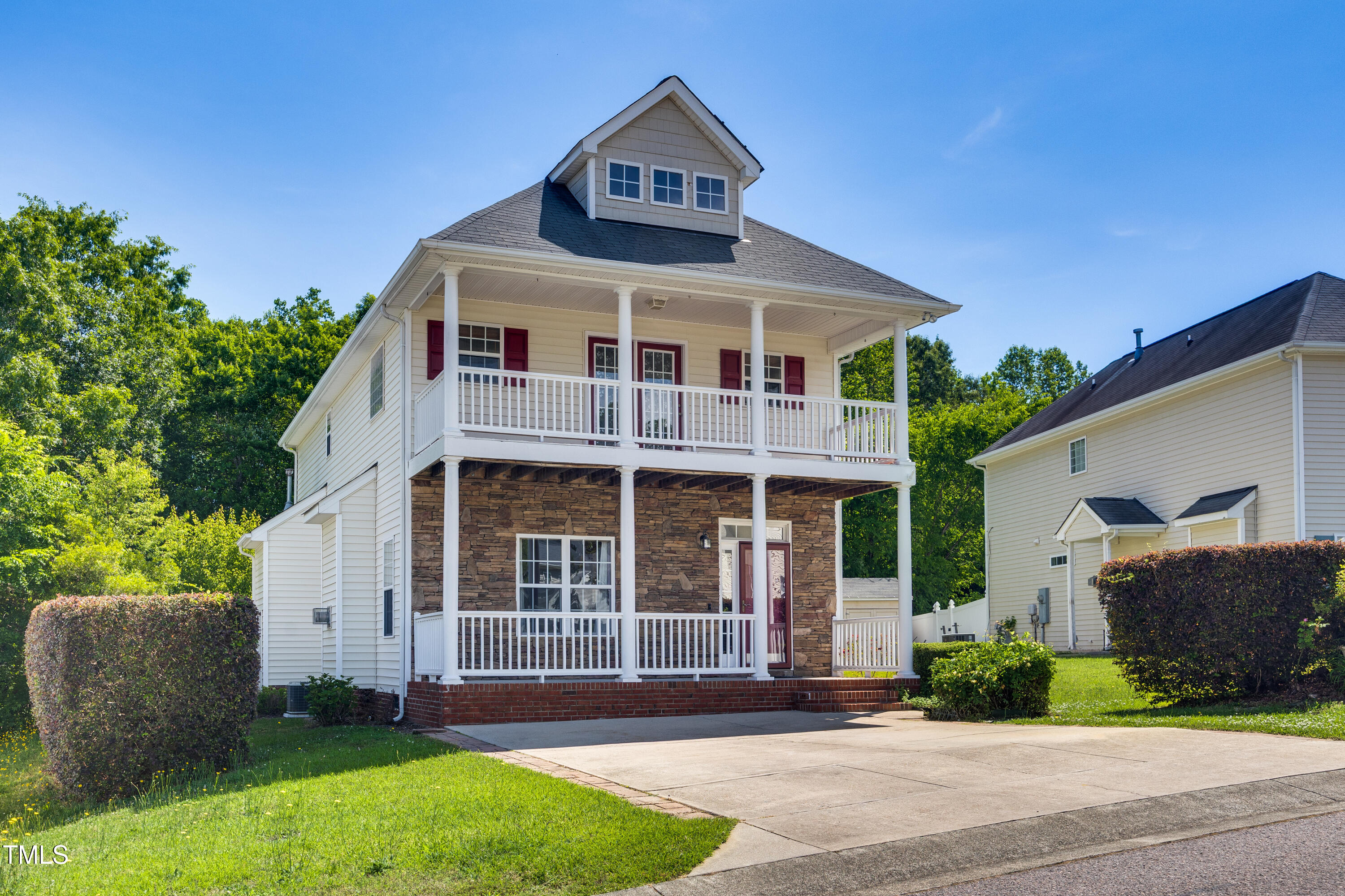 5865 Forest Point Road Raleigh, NC 27610 - Photo 2 of 37 a front view of a house with a yard