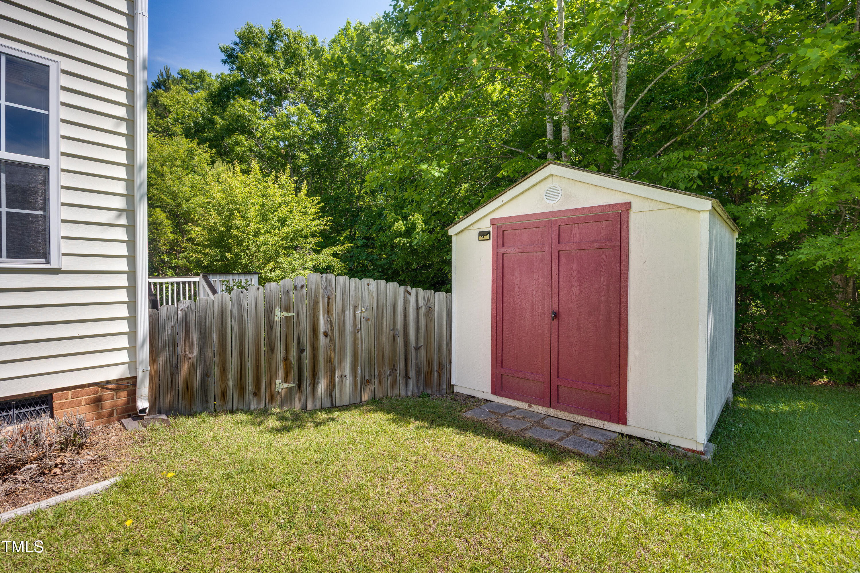5865 Forest Point Road Raleigh, NC 27610 - Photo 34 of 37 a backyard of a house