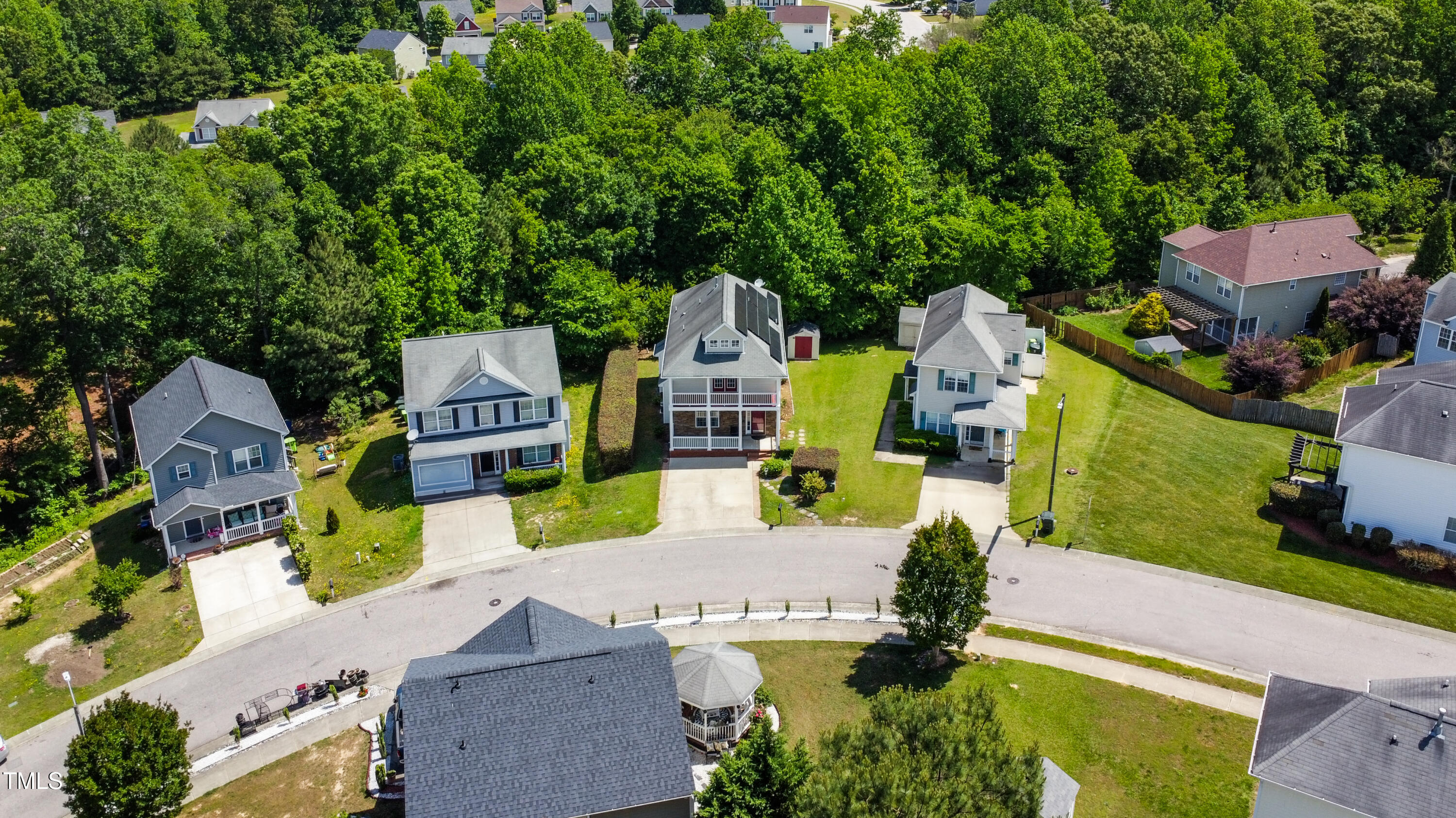 5865 Forest Point Road Raleigh, NC 27610 - Photo 35 of 37 an aerial view of a houses with yard