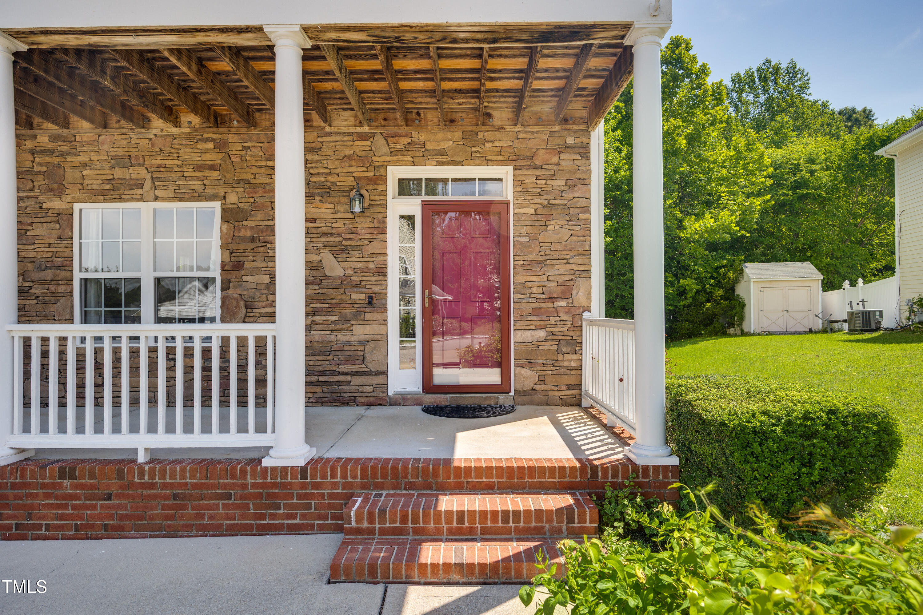 5865 Forest Point Road Raleigh, NC 27610 - Photo 5 of 37 a front view of a house with a yard