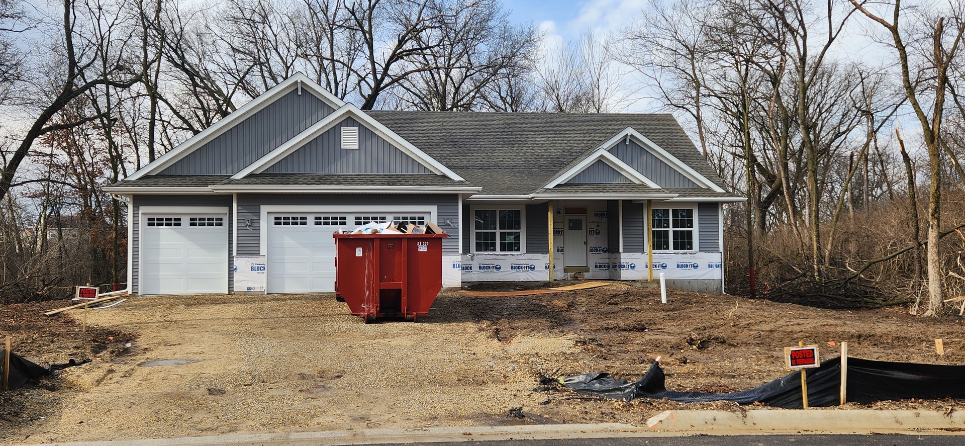 6013 Squirrel Run Loves Park, IL 61111 - Photo 1 of 15 a front view of a house with garden