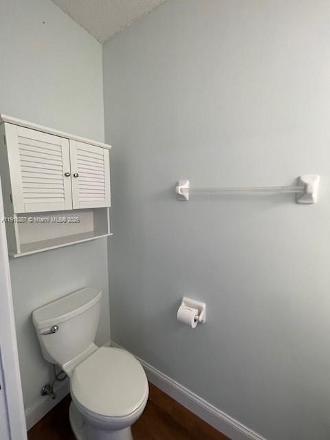 4938 Palmbrooke Circle West Palm Beach, FL 33417 - Photo 14 of 32 a white toilet sitting next to a shower