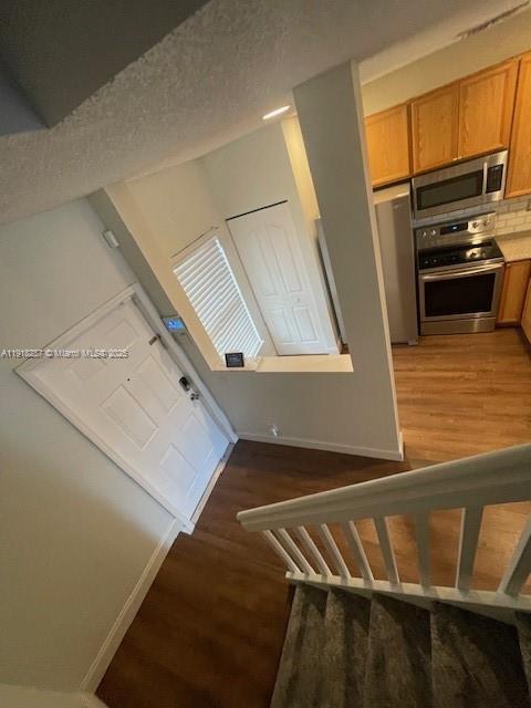 4938 Palmbrooke Circle West Palm Beach, FL 33417 - Photo 15 of 32 a view of kitchen and an empty room