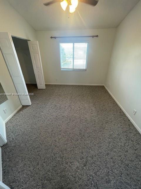 4938 Palmbrooke Circle West Palm Beach, FL 33417 - Photo 22 of 32 an empty room with a window