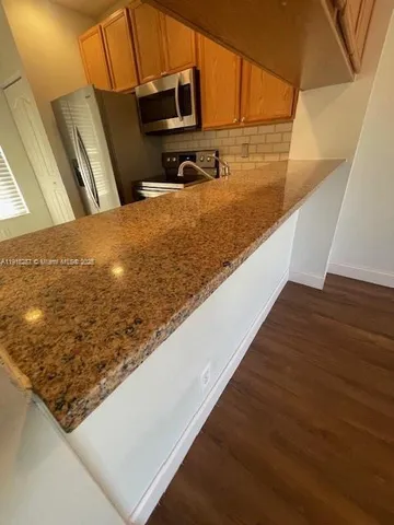 a view of swimming pool from a balcony