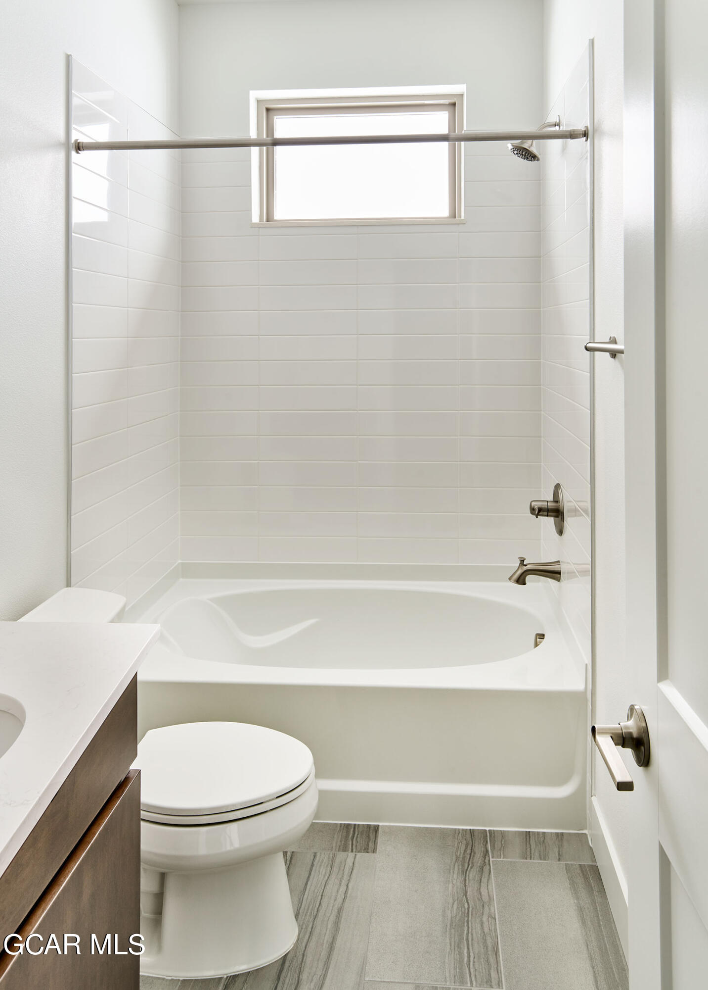 156 Homestead Loop Fraser, CO 80442 - Photo 14 of 16 a bathroom with a toilet and a bathtub
