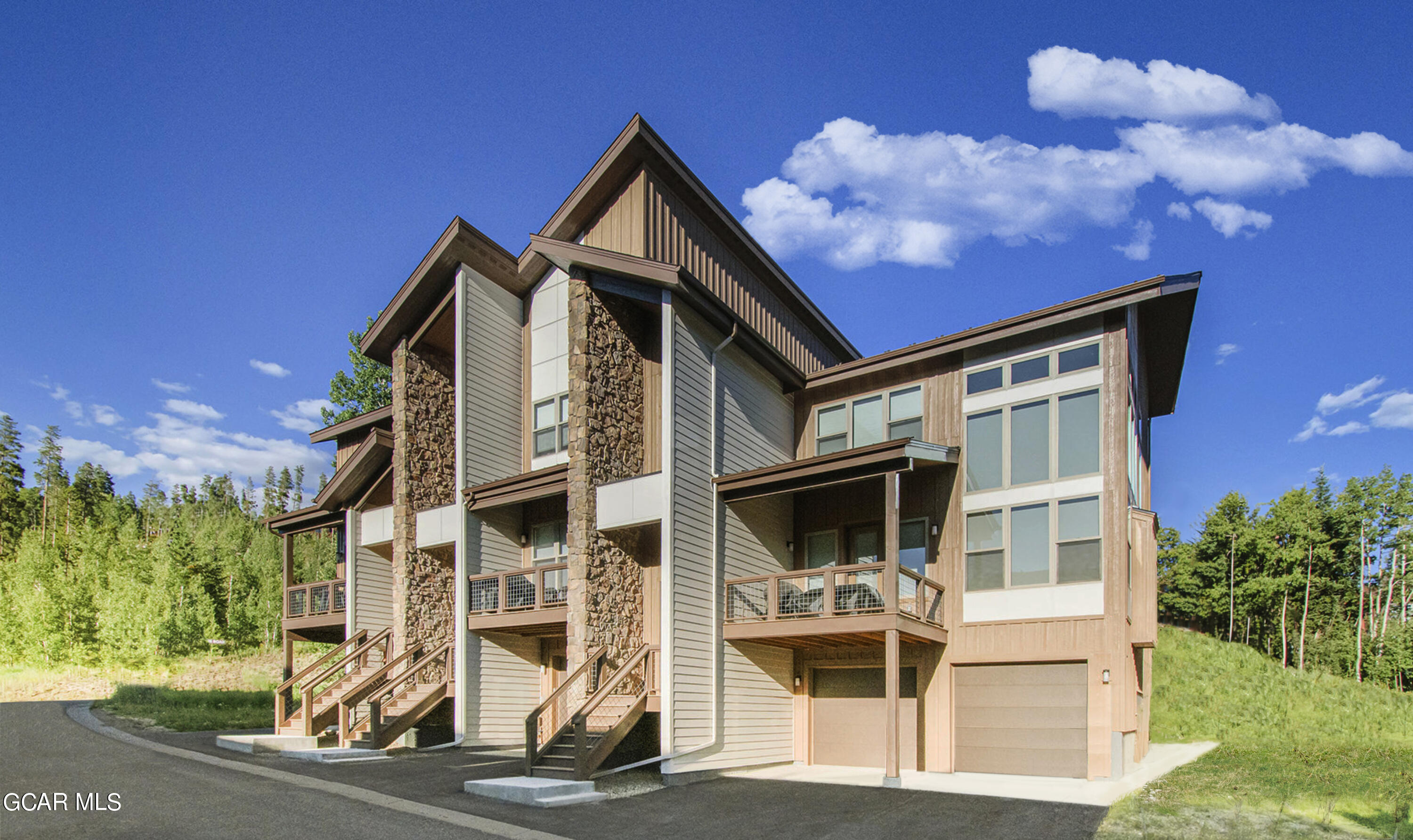 156 Homestead Loop Fraser, CO 80442 - Photo 3 of 16 a view of a house with backyard