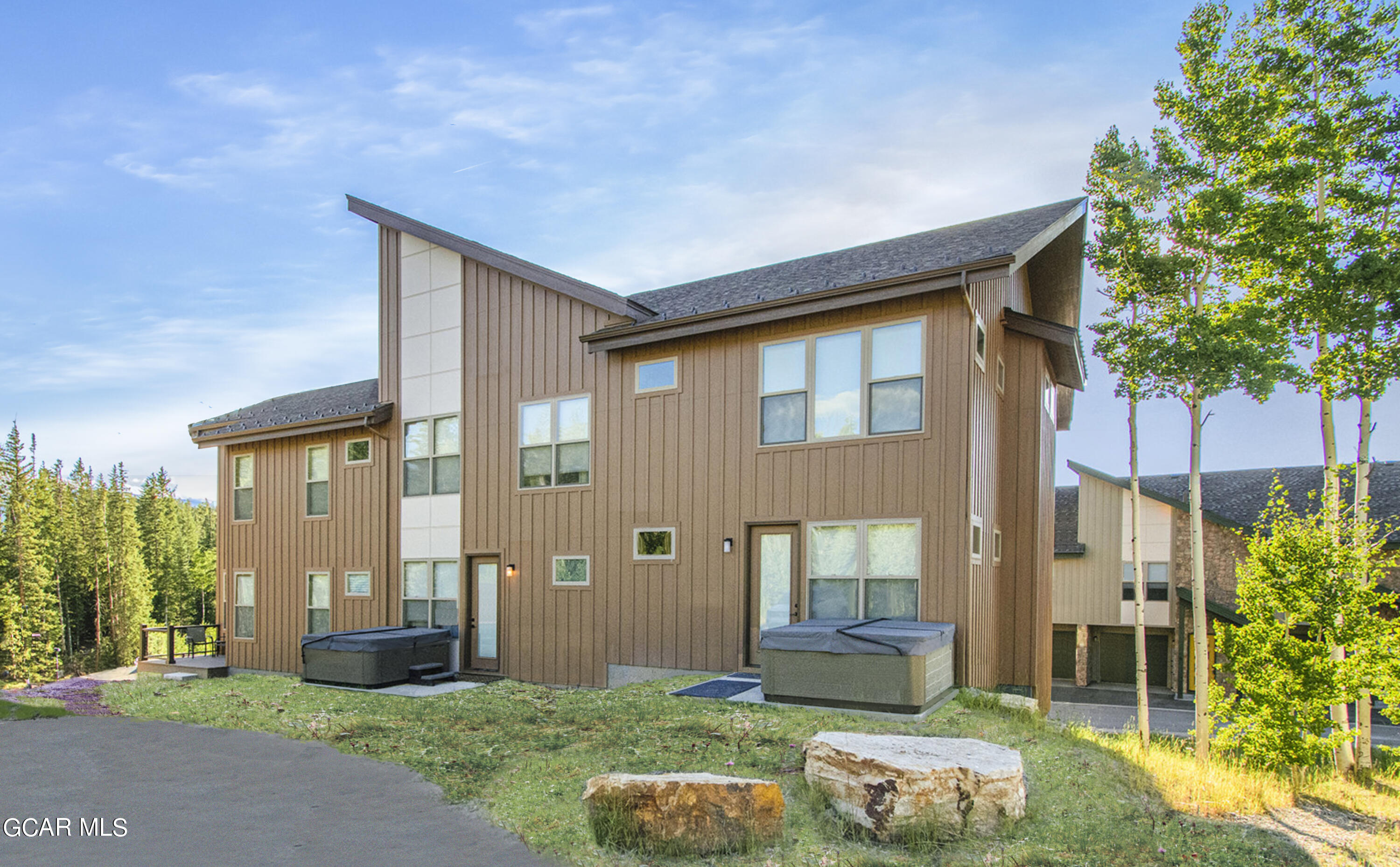156 Homestead Loop Fraser, CO 80442 - Photo 4 of 16 a backyard of a house with yard barbeque oven and outdoor seating