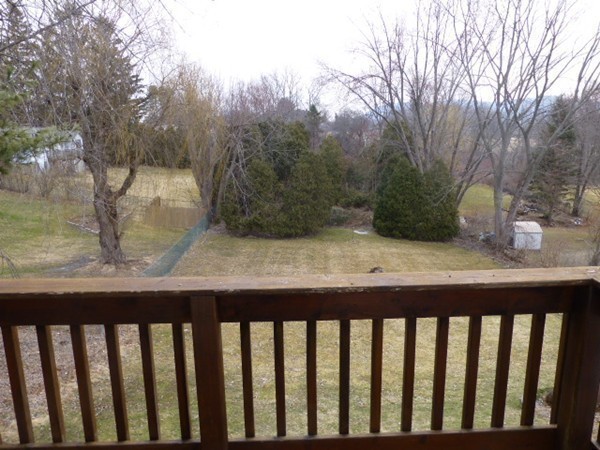 57 Florence Road Easthampton, MA 01027 - Photo 16 of 29 a wooden bench sitting on top of a wooden floor