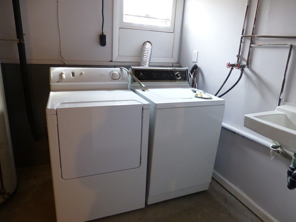 57 Florence Road Easthampton, MA 01027 - Photo 28 of 29 a utility room with dryer and washer