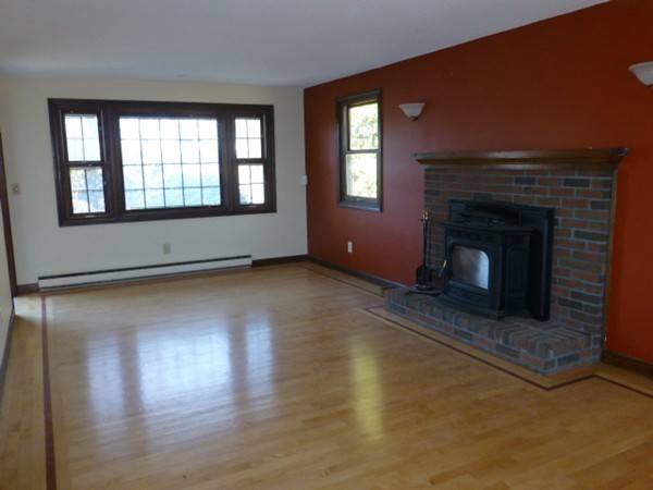 57 Florence Road Easthampton, MA 01027 - Photo 6 of 29 a living room with a fireplace
