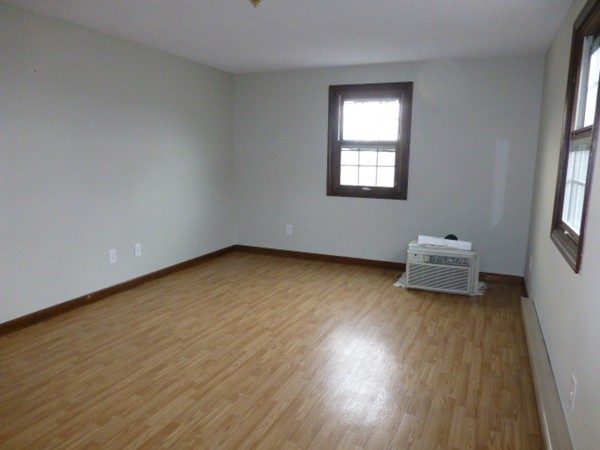 57 Florence Road Easthampton, MA 01027 - Photo 7 of 29 a view of a room with wooden floor and window