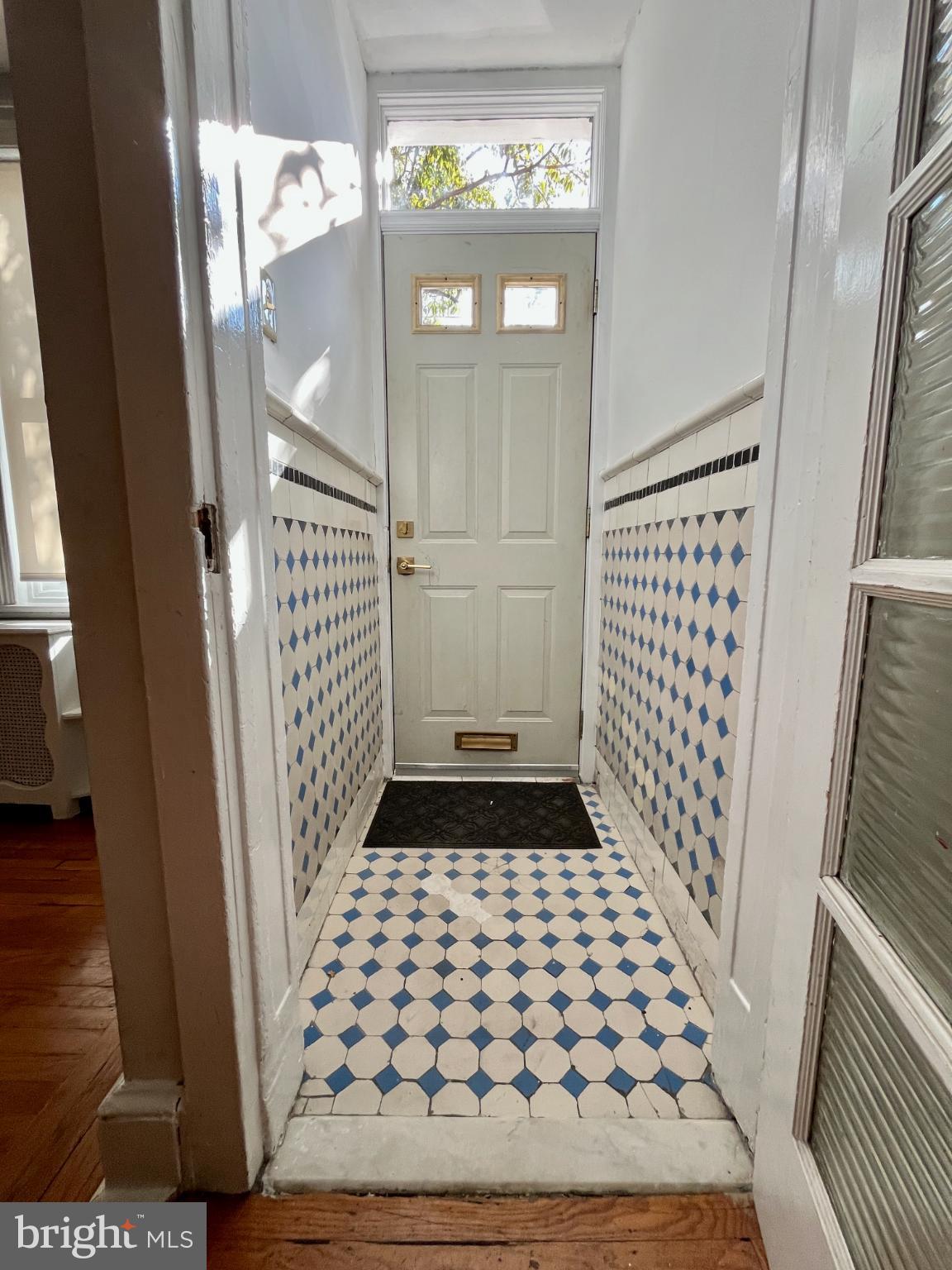 1217 Wharton Street Philadelphia, PA 19147 - Photo 4 of 27 a bathroom with a sink a mirror and shower