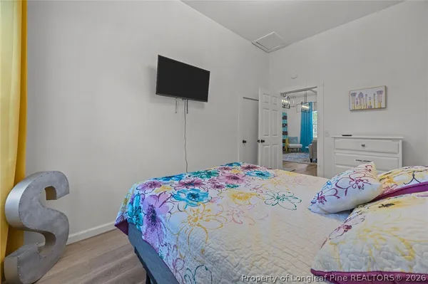 a view of backyard with a garden and entertaining space