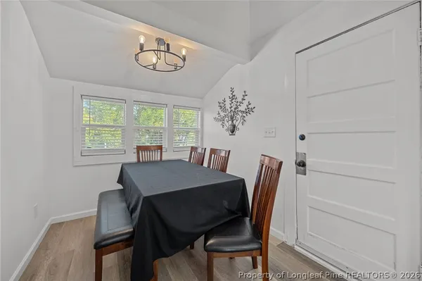 a workspace with furniture and a window