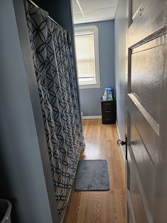 418 Anthony Street Fall River, MA 02721 - Photo 4 of 8 a room with a couch chair and a wooden floor