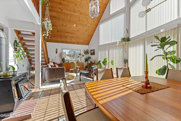 a kitchen with stainless steel appliances a refrigerator sink and microwave