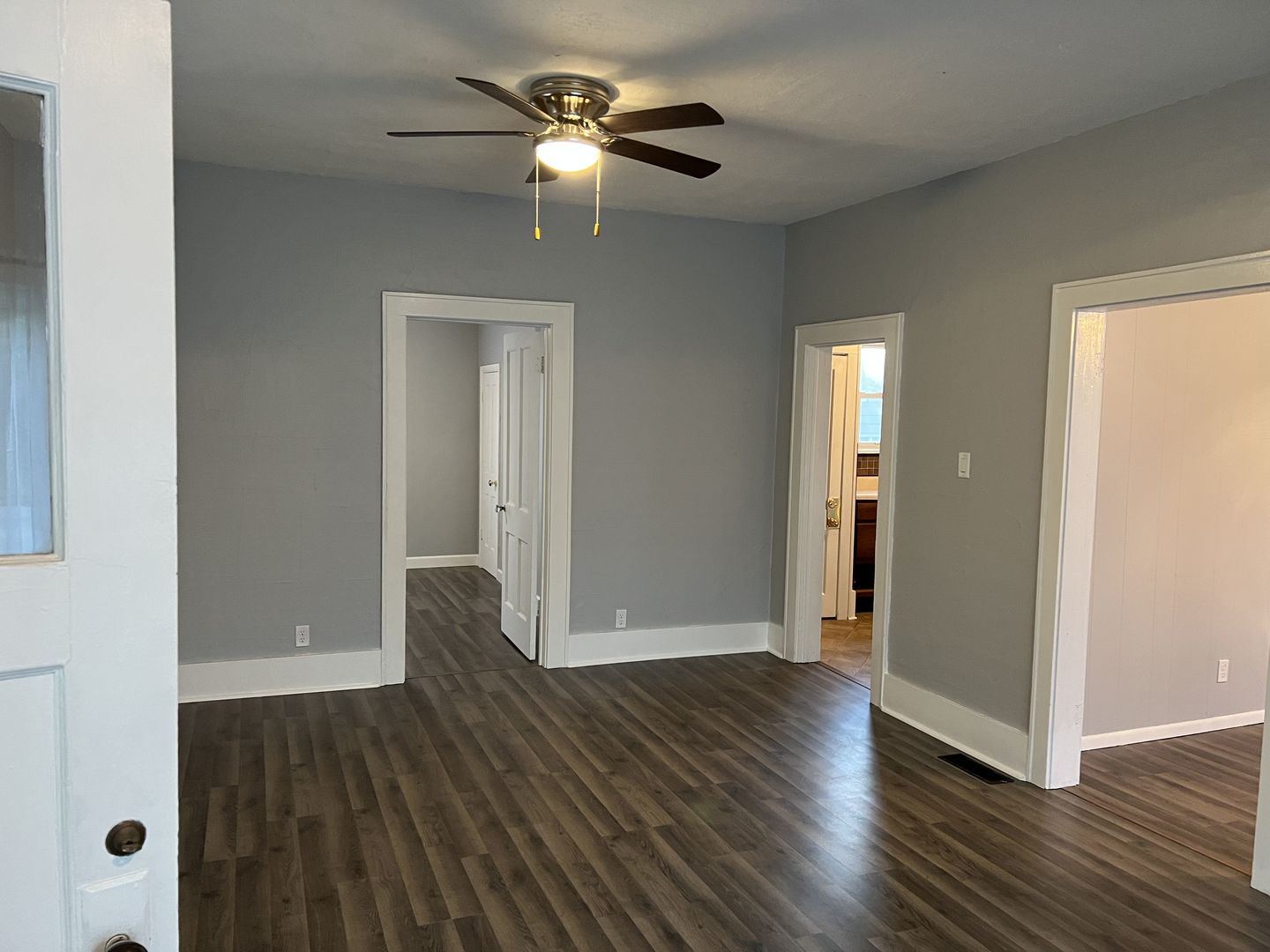 252 Ottawa Road Paxton, IL 60957 - Photo 11 of 14 wooden floor in an empty room with a window