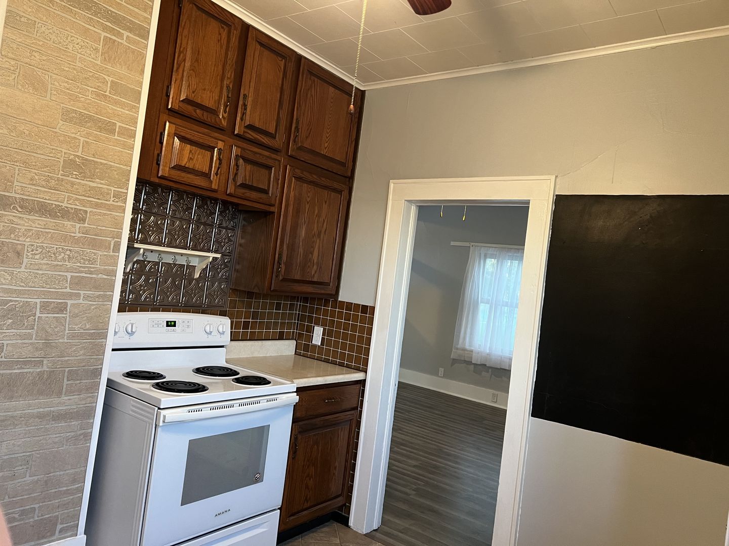 252 Ottawa Road Paxton, IL 60957 - Photo 13 of 14 a view of washer and dryer with wooden floor