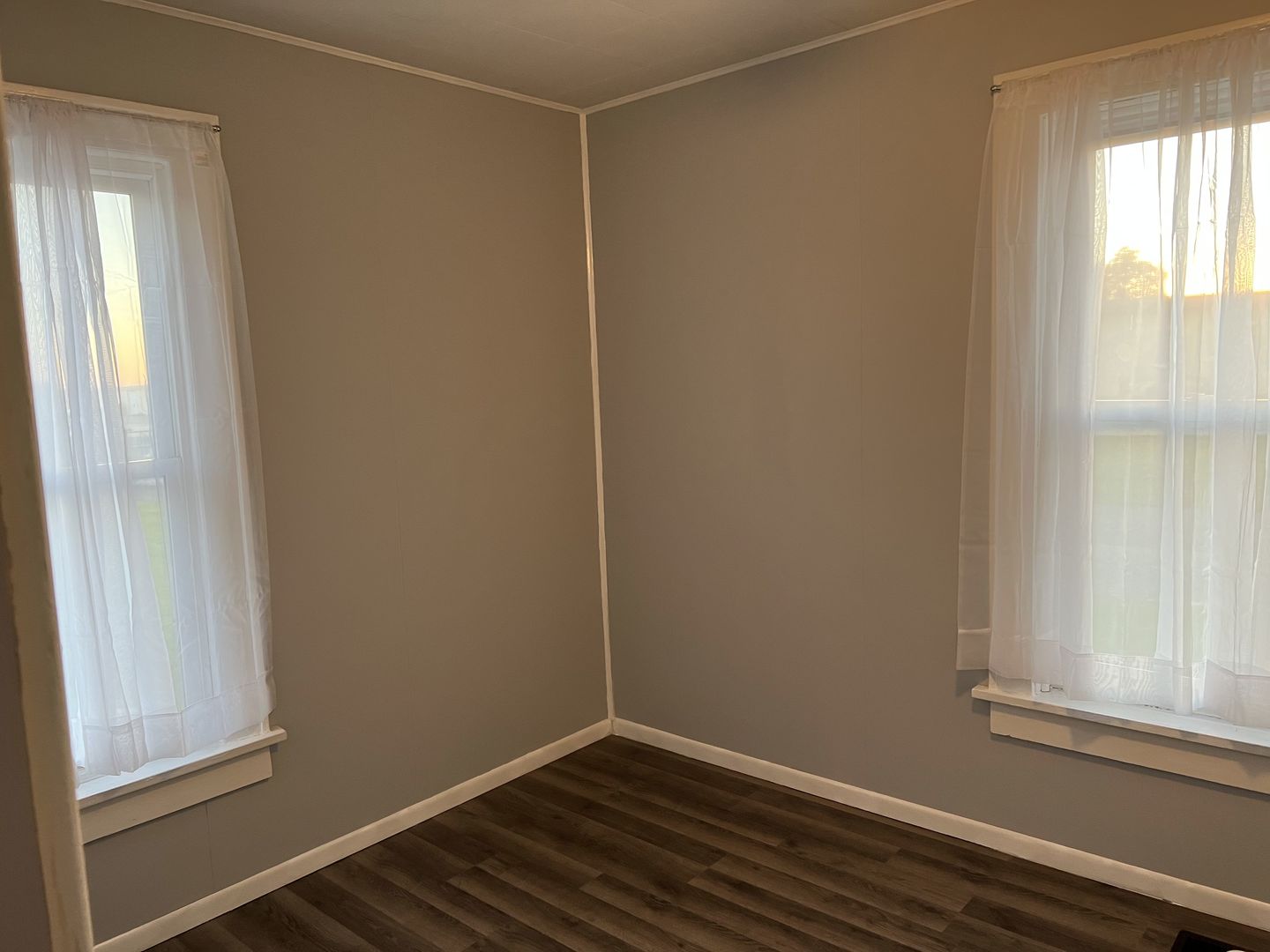 252 Ottawa Road Paxton, IL 60957 - Photo 6 of 14 a view of a small space with wooden floor and a window