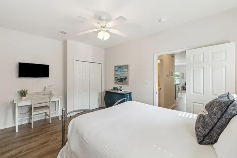 a view of a porch with wooden floor